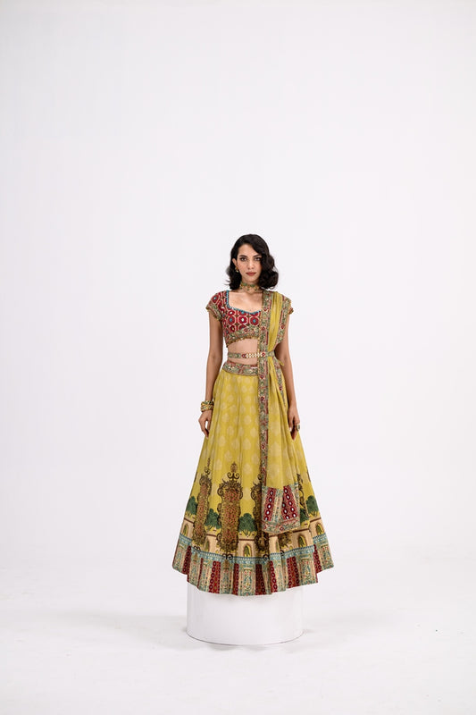 Mustard Print Lehenga Paired With Red Honey Comb Bralette And Dupatta