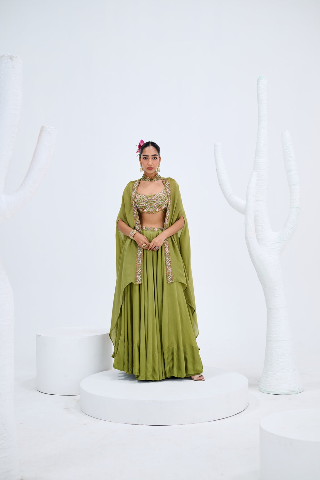 OLIVE GREEN LEHENGA PAIRED WITH EMBROIDERED BUSTIER AND CAPE SET