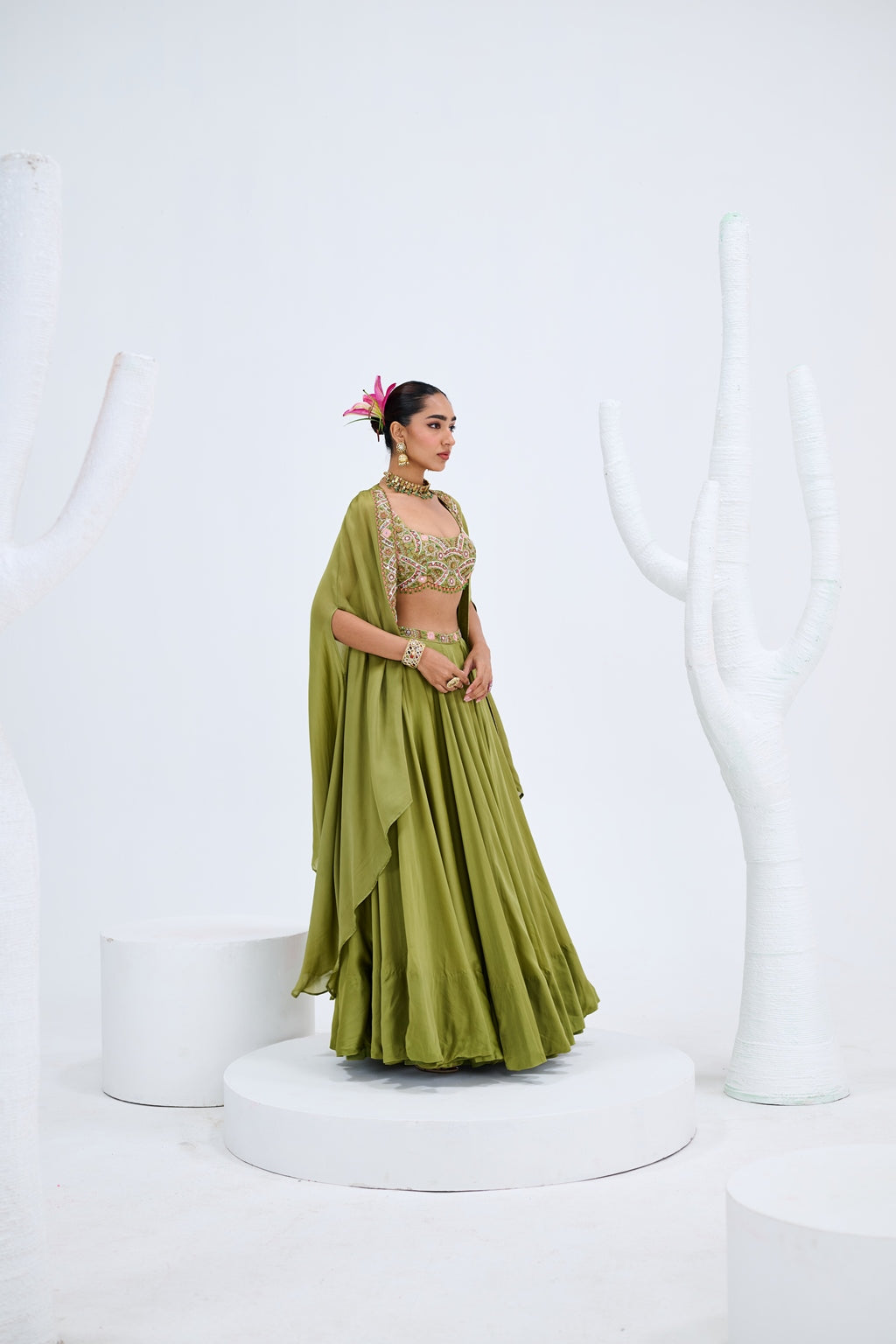 OLIVE GREEN LEHENGA PAIRED WITH EMBROIDERED BUSTIER AND CAPE SET