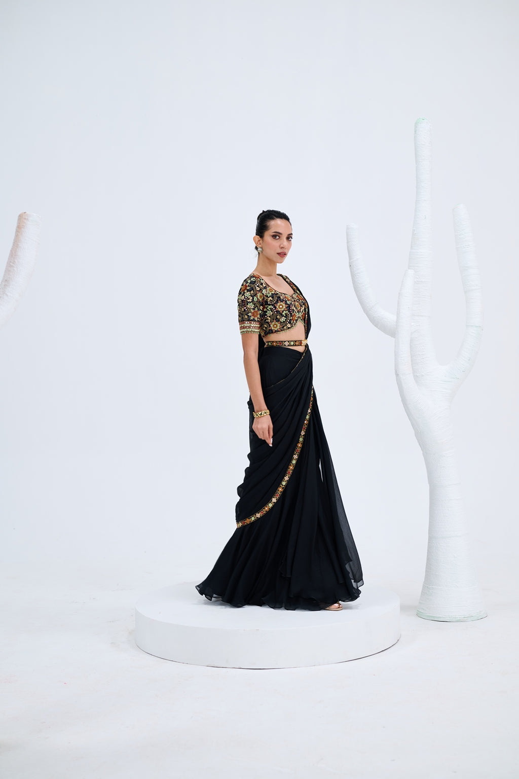 EBONY PRE DRAPED SAREE PAIRED WITH EMBROIDERED BLOUSE AND POLKI EMEBELISHED BELT