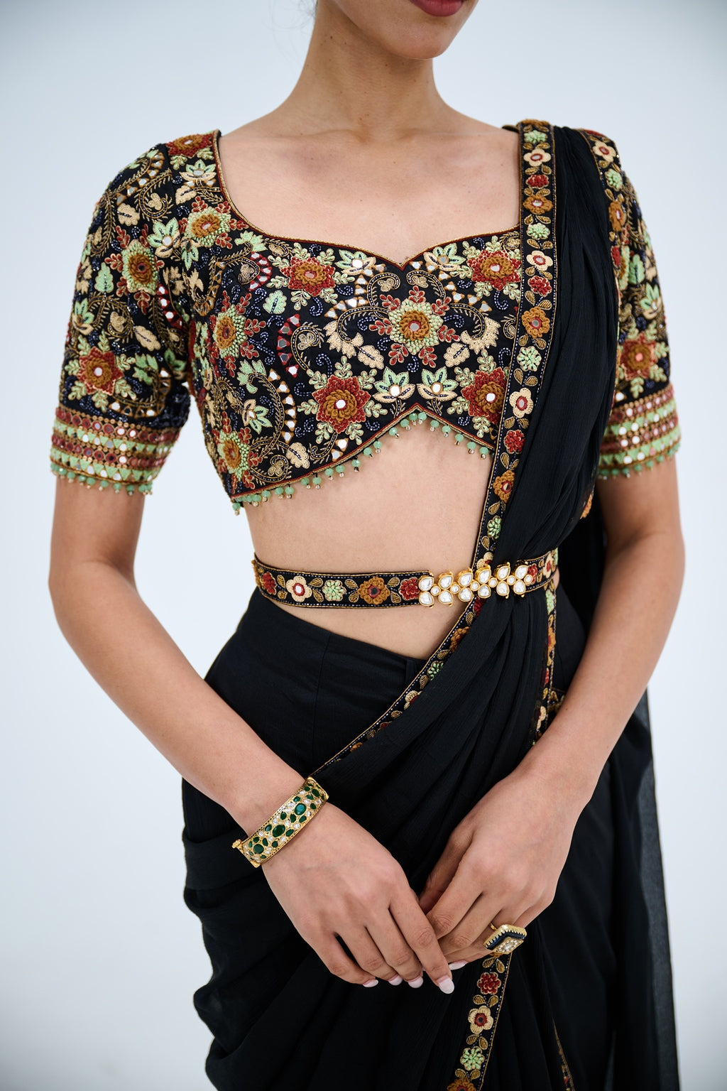 EBONY PRE DRAPED SAREE PAIRED WITH EMBROIDERED BLOUSE AND POLKI EMEBELISHED BELT