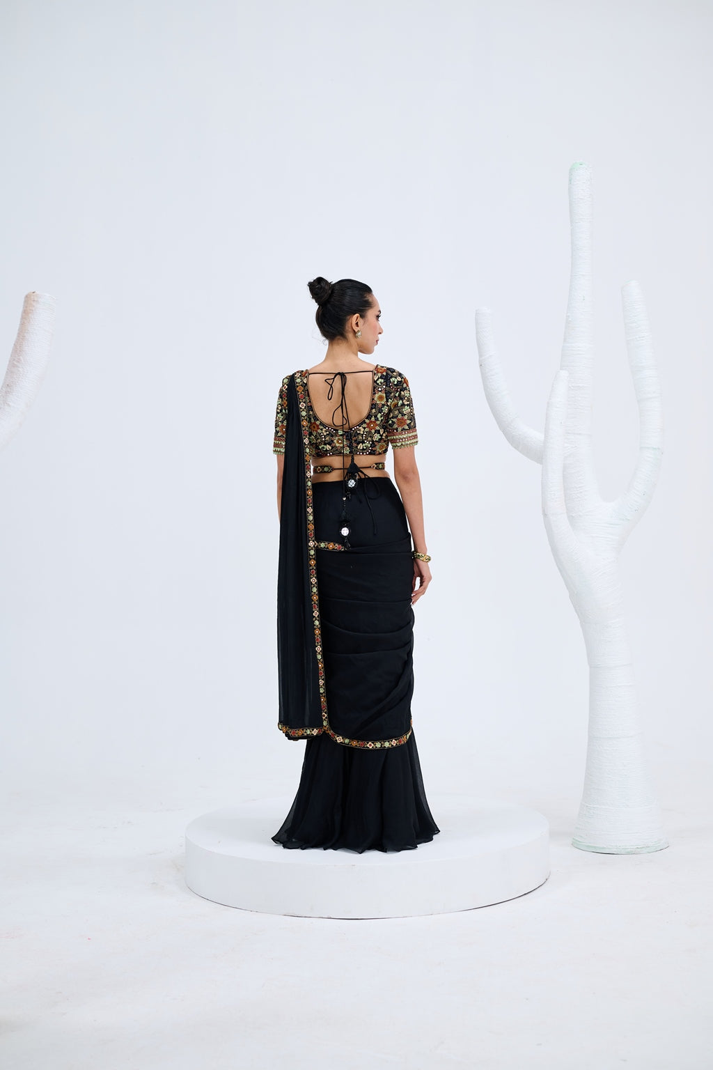 EBONY PRE DRAPED SAREE PAIRED WITH EMBROIDERED BLOUSE AND POLKI EMEBELISHED BELT