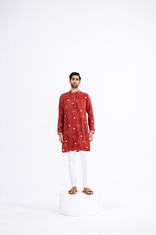 Red Overall Kurta Paired With White Pants And Highlight Sleeve Border