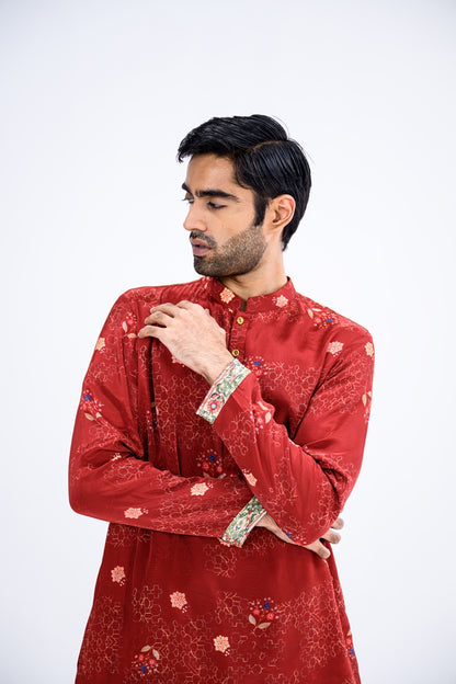 Red Overall Kurta Paired With White Pants And Highlight Sleeve Border