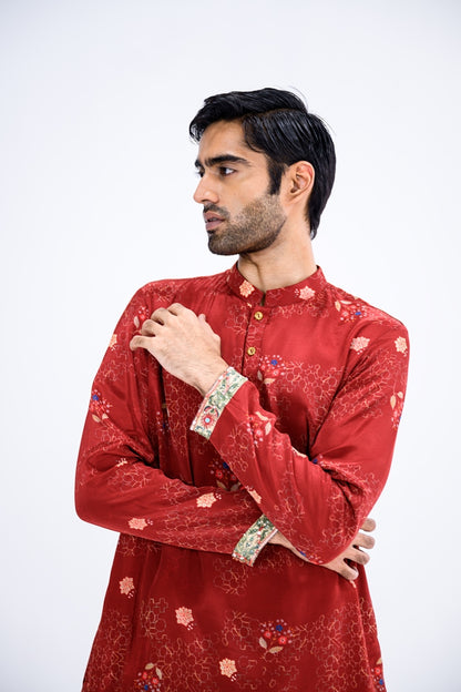 Red Overall Kurta Paired With White Pants And Highlight Sleeve Border