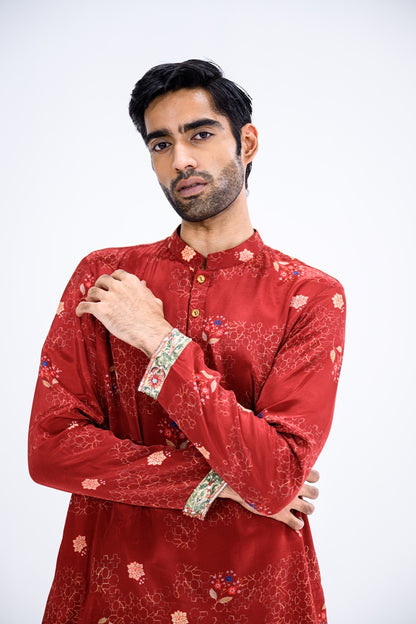 Red Overall Kurta Paired With White Pants And Highlight Sleeve Border