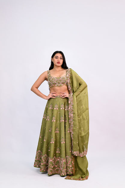 OLIVE GREEN BUTI LEHENGA PAIRED WITH EMBROIDERED BLOUSE WITH CUT WORK DUPATTA