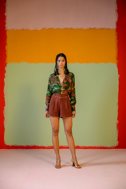 Green Shirt Paired With Camel Shorts