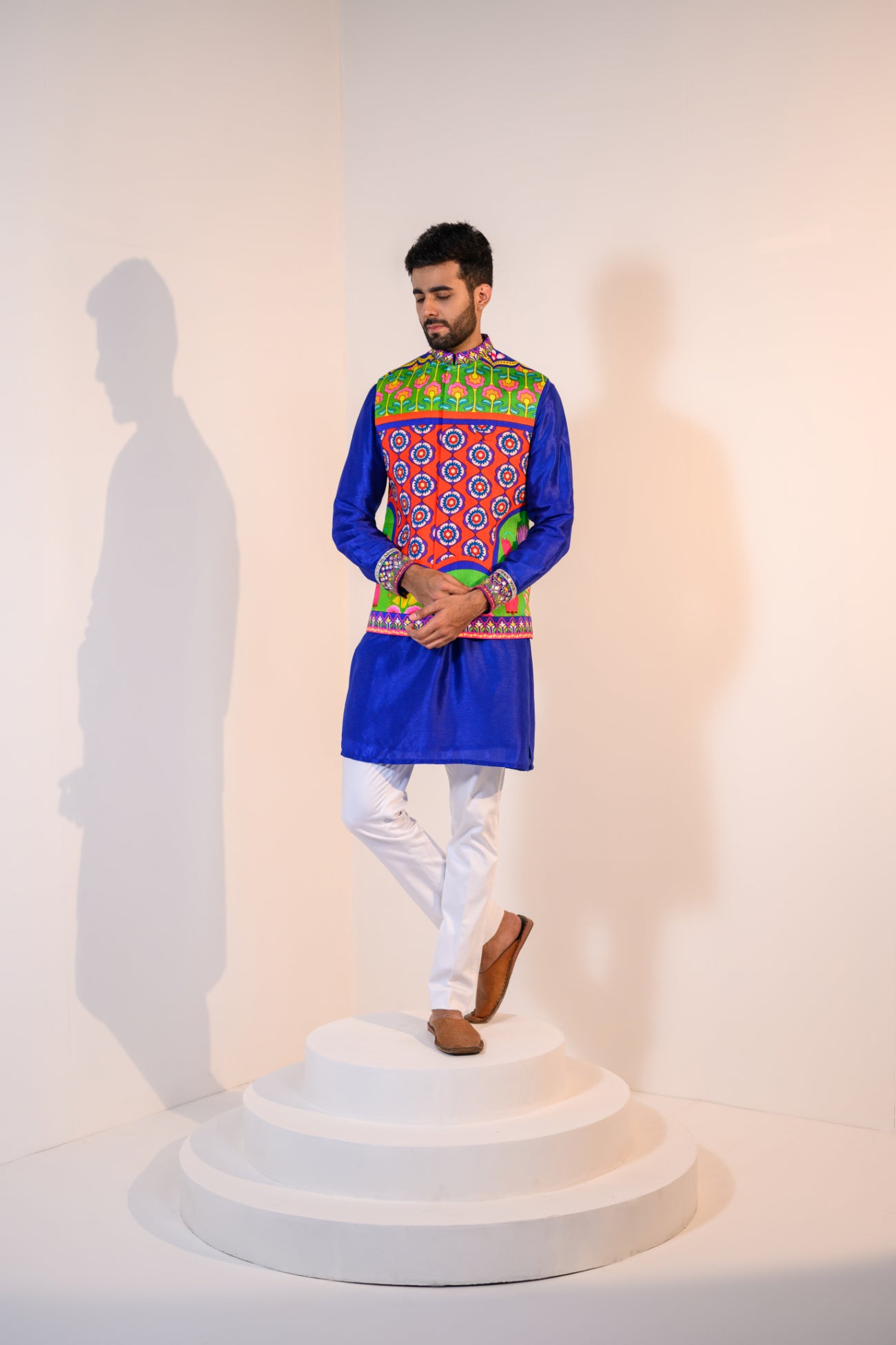 Blue kurta with embroidered cuff paired with our veronica bundi and pants