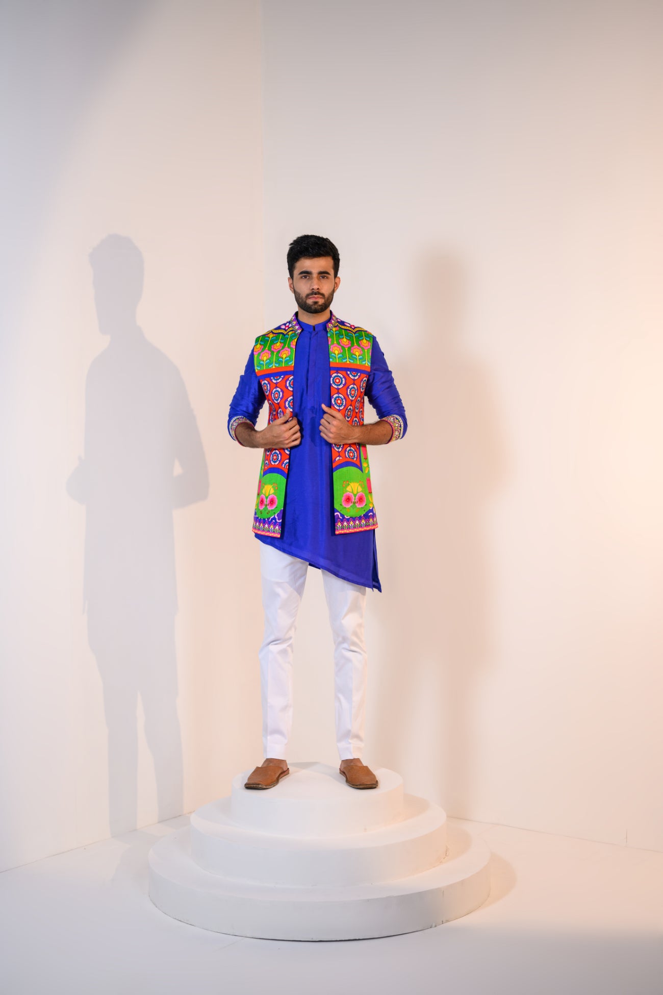 Our blue assymetrical kurta paired with veronica half jacket and pants